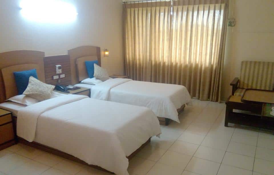 Hotel Woodlands Vapi - Location, Photos, Reviews